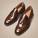 brown tasseled loafers image